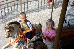 George and Steedley on the carousel