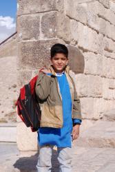 A school boy outside Aleppo's citadel
