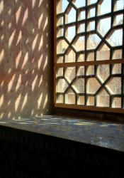 Light streams in on mosaic covered window sills