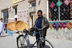 A bread seller on his bicycle