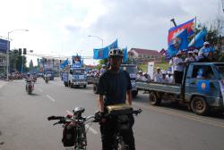 An election parade overtakes us