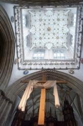 Looking up at the ceiling. 