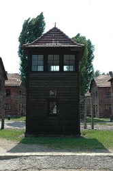 A close-up of a watchtower at Auschwitz
