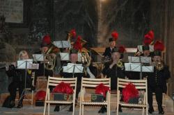 A band playing inside the mine