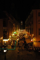 The main street of bars and restaurants in Dresden, seen at night