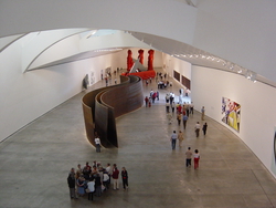 The first floor gallery of the Guggenheim, as seen from one floor up.