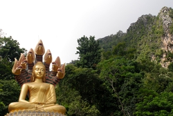 Buddha set against the mountains
