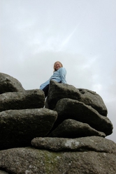 Alexa climbing the rocks