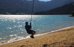 Andrew on a rope swing