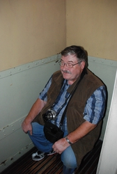 Paul trying out some ship toilets, as it once was, in the Immigration Museum, Bremerhaven