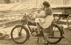 1949 - Elfriede Rother and Inge Rother on the motorbike Max used to sell spices with.jpg
