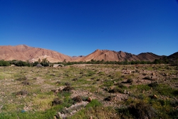 A cemetery in the shade of the mountains